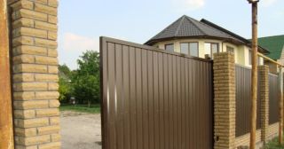 Купить откатные ворота из профнастила Переславль-Залесский, цена от 1748 руб.